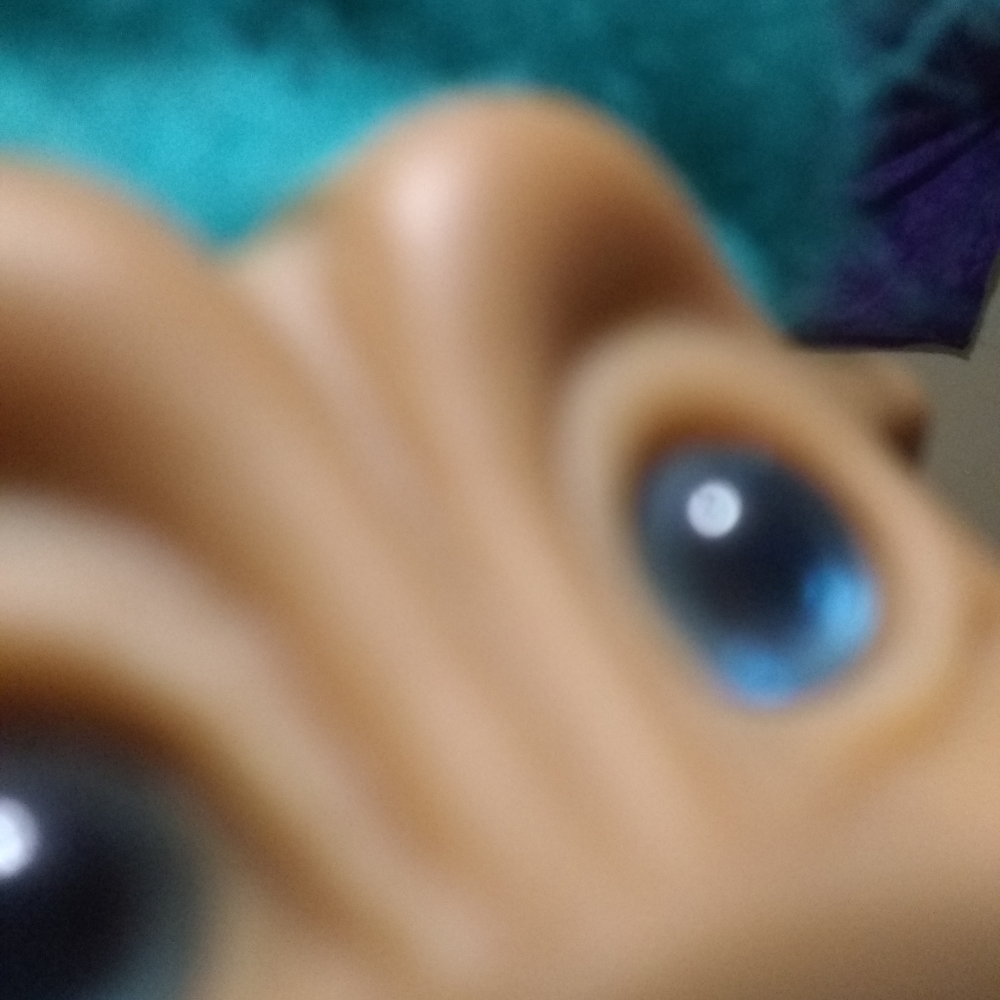 My turquoise haired Treasure Troll!